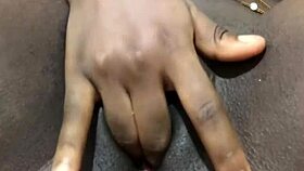yo, peep this homemade ebony babe fingering her pussy lips solo