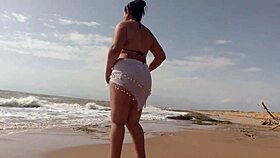 horny latina with huge ass masturbates wildly on sunny beach