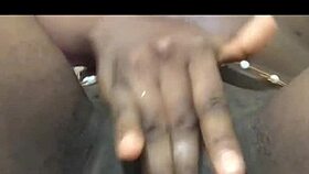 yo, peep this homemade ebony babe fingering her pussy lips solo