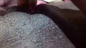 yo, peep this homemade ebony babe fingering her pussy lips solo