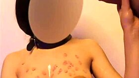 master guides submissive through intense candle wax roleplay sensations