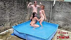 two hot babes get wet fucking in the pool