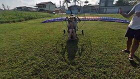 Priscila Belini strips naked on paramotor, masturbates wildly.