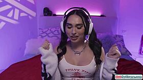 Shemale gamer relaxes as girlfriend strokes her cock