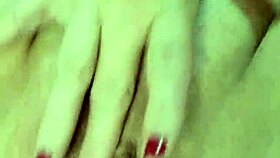 Huge clit and pussy lips fetish with mature blonde's feet exposed.