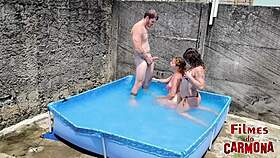 two hot babes get wet fucking in the pool