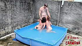 two hot babes get wet fucking in the pool