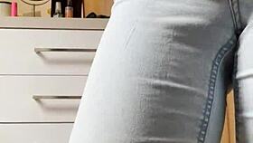 um, like, watch this cute homemade petite blonde tease stripping tight jeans off slowly...