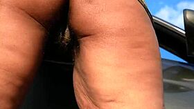 ebony milf flashes swollen hairy pussy no panties in parking lot