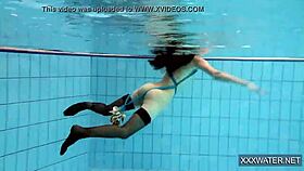 Hot hungarian teen 18+ dives underwater for shaved pussy pool teasing.