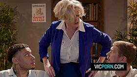 American Busty Mature Dee Williams Gets Hard Double Penetration in Library