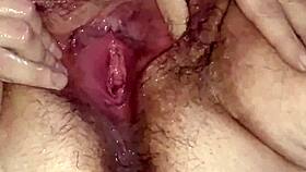 check out this fat hairy pussy getting fist fucked till it squirts nasty