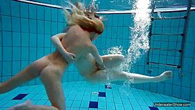 two pool lesbians dive into shaved blonde passion