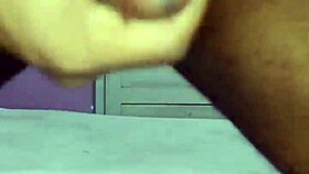 hot young stud strokes massive cock with intense handjob power