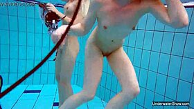 two pool lesbians dive into shaved blonde passion