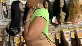 Big booty ebony teases wildly while shopping for new wig