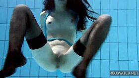 Hot hungarian teen 18+ dives underwater for shaved pussy pool teasing.