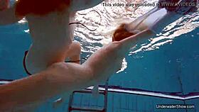 two pool lesbians dive into shaved blonde passion