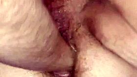 check out this fat hairy pussy getting fist fucked till it squirts nasty