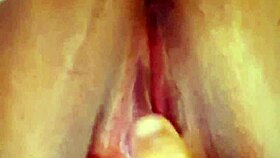 hey check this big tits babe fingering sensually close up