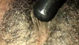 ebony babe fingers her dripping wet hairy pussy solo