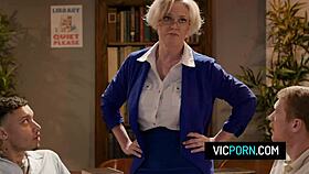 American Busty Mature Dee Williams Gets Hard Double Penetration in Library