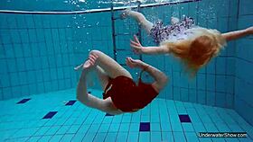 two pool lesbians dive into shaved blonde passion