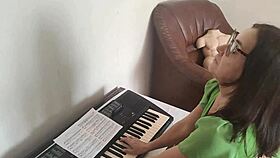 Strict teacher rides Tantaly doll cock during music lesson