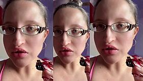 a tall girl with glasses chews food intensely in relaxing asmr session