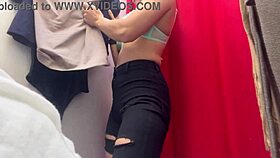 check out this hidden cam of a big tits milf undressing in changing room