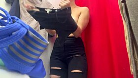 check out this hidden cam of a big tits milf undressing in changing room