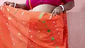 Saree-clad brunette beauty poses elegantly