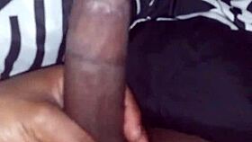 stroking my big black cock before sliding into bed