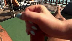 hot babe delivers fast sloppy handjob on ocean-view terrace balcony