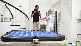 sexy blonde masseuse andi avalon slides wet nuru over scotty p's big boobs client