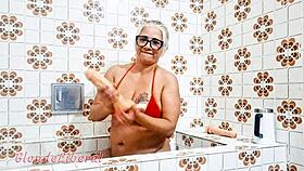 blonde milf shoves dildo in pussy bathroom pissing solo