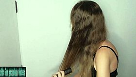 Applying fresh milk carefully to friend's hair for smooth combing