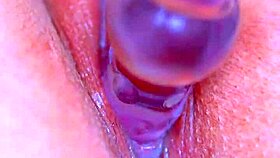 oh yeah her puffy pussy takes that glass dildo deep!