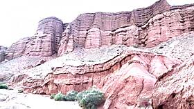 couple's skinny teen gives deep glasses blowjob in scenic canyon