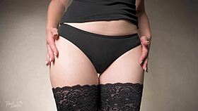 she teases thigh gap sensually in lingerie fishnets