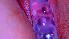 oh yeah her puffy pussy takes that glass dildo deep!
