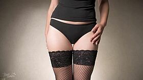 she teases thigh gap sensually in lingerie fishnets
