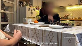husband jerks under kitchen table while i watch