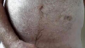 Hairy big belly mature strokes small cock to orgasm in homemade voyeur clip