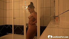 amazing brunette babe showers while her guy films her fun