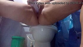 neighbor sneaks masturbation session in bathroom with wet toy play
