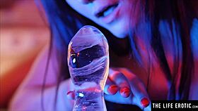 Brunette rams huge ice dildo into tight asshole closeup