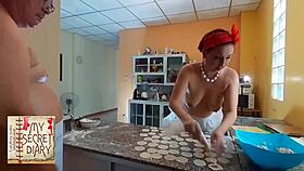 Naked housekeeper bakes nude in kitchen flashing tits bare feet voyeur style 😏🍑