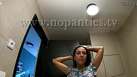 tattooed petite alia strips panties in bathroom flashing shaved tight pussy and ass