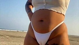 redhead beach exhibitionist flashes big swollen pussy lips